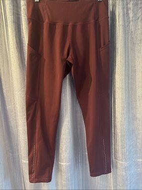 Lululemon Fast and Free high rise tight 23"
Burgundy.  Size 8